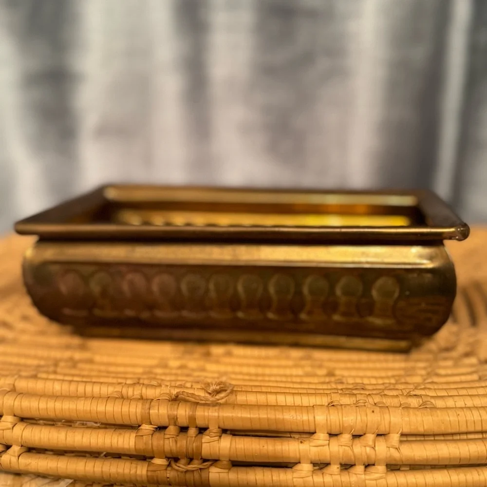 vintage brass planter, also known as a jardinière or cachepot.